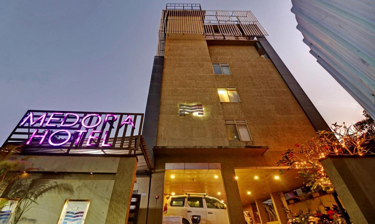 Medora Hotel Kozhikode Buitenkant foto