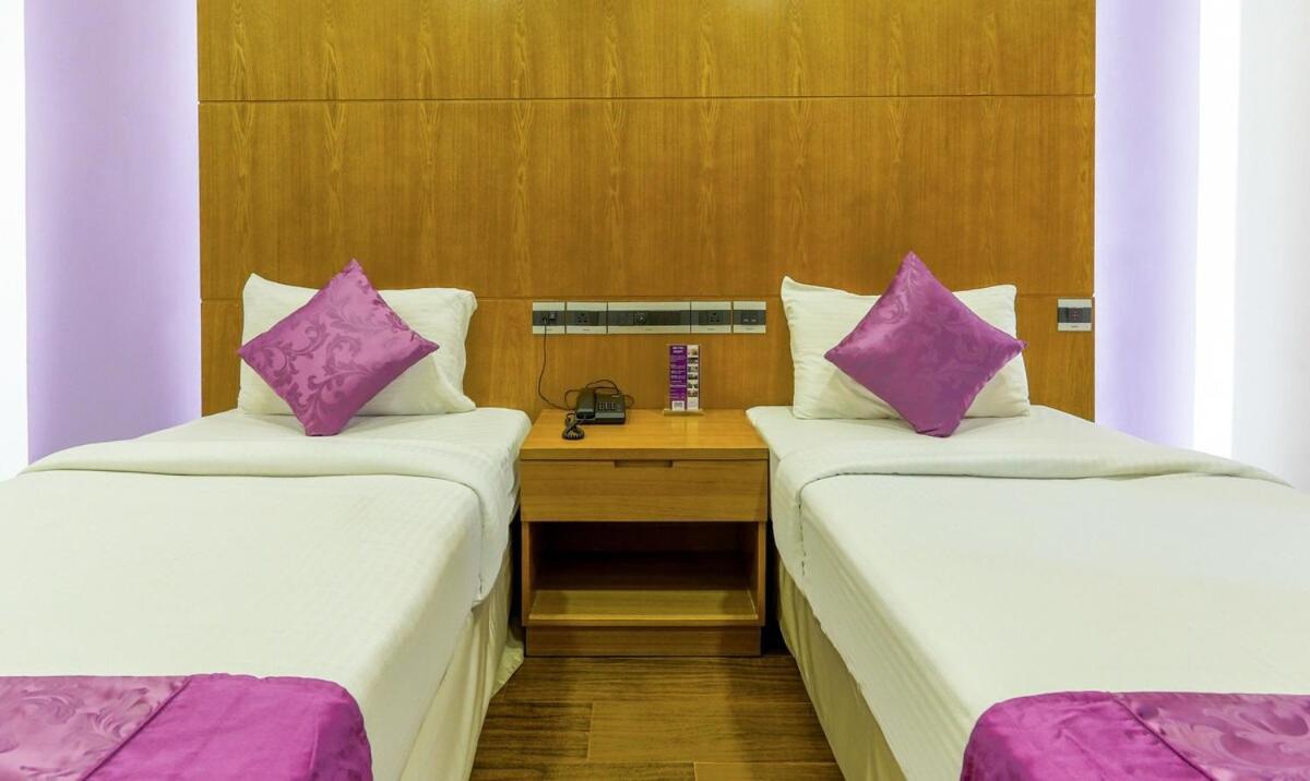 Medora Hotel Kozhikode Buitenkant foto