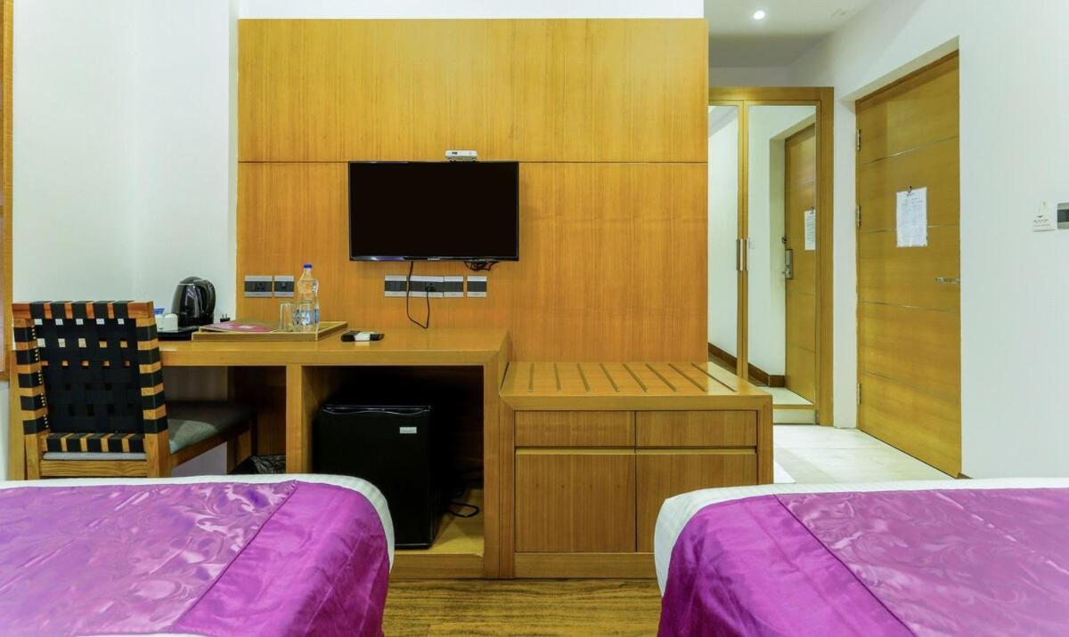 Medora Hotel Kozhikode Buitenkant foto